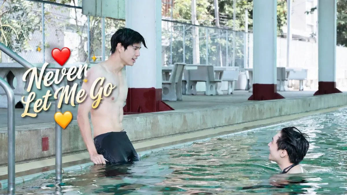 Thai BL romance drama still featuring a shirtless young man getting out of a swimming pool talking to another man in the water