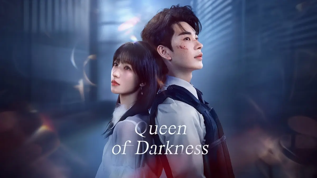 A dark haired woman standing back to back with a bruised young man in a tactical vest against a dark blue background